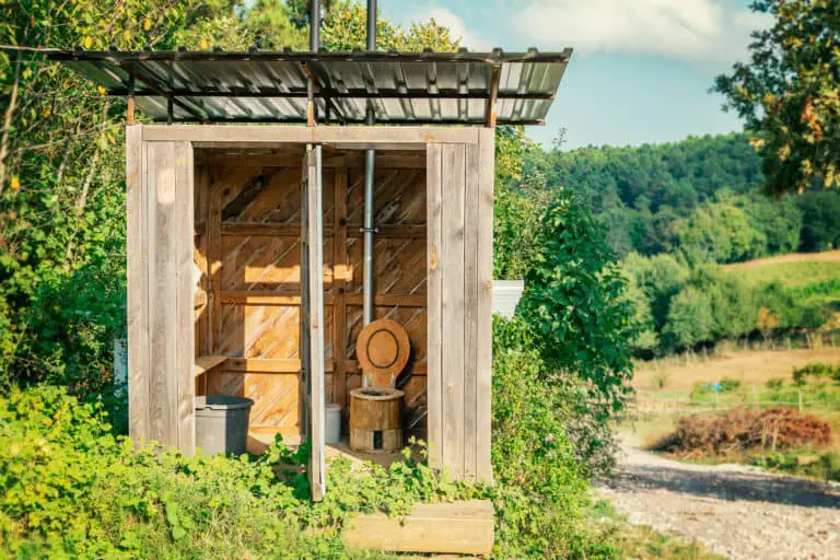 Wooden composting toilet on eco-farm