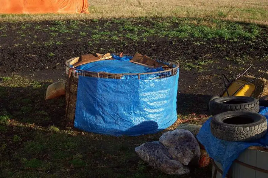 compost covered with tarp