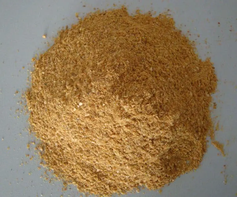 pile corn gluten meal which can be used to get rid of a lawn full of weeds
